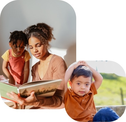 A woman reads a book to a young girl, while nearby, a young boy with Down syndrome sits outside with his hands on his head. Both children are wearing casual clothes.